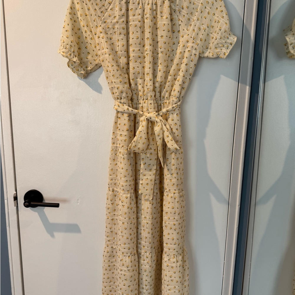 Pale yellow dress with yellow flowers
